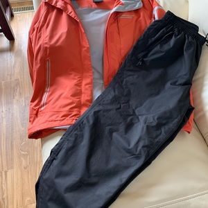 Brand new rain suit comes with pants and jacket.